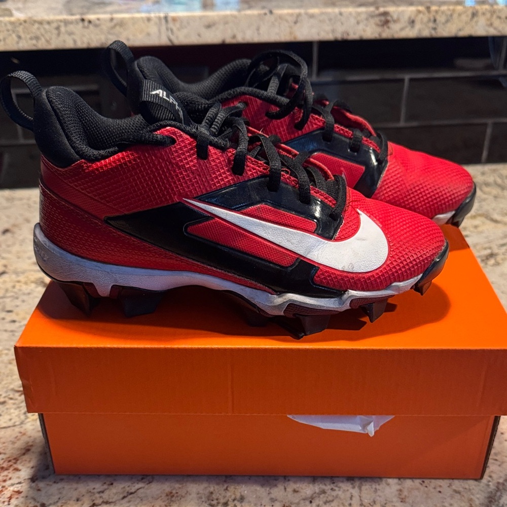 Nike Kids Red and Black cleats size 2.5